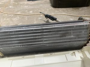 Clean aircon evaporator coil after chemical wash and overhaul service