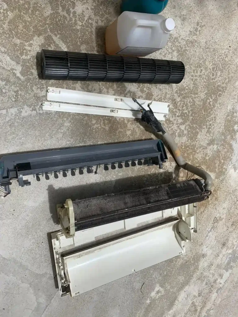 Aircon chemical overhaul service with full dismantling of indoor unit components for deep cleaning